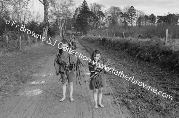 TOMMY & ELIZABETH MCEVOY AS BEGGARS FOR FOXFORD FILM